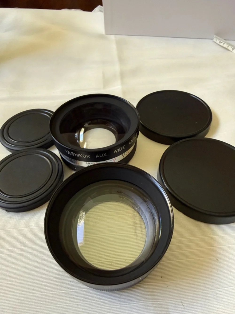 Set of 2 VTG Yashica Yashikor aux Telephoto & Wide Angle 1:4 Lens with cups